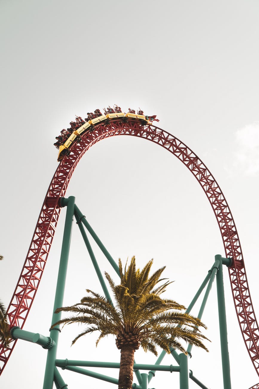 high scary roller coaster against gray sky